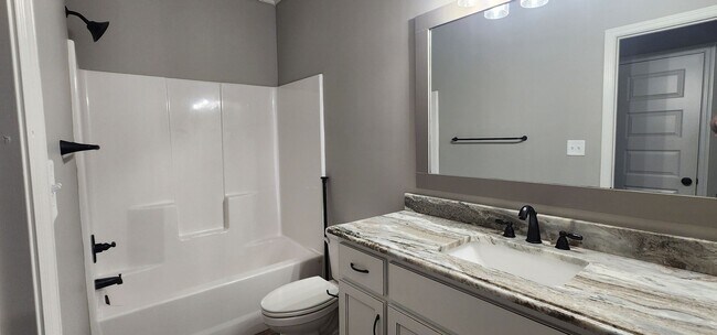 Building Photo - Elegant 4-Bedroom Valdosta Home with Vaulted Ceilings, Pool, and Outdoor Living