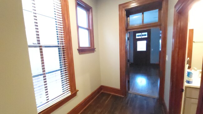 big windows in back hallway - 2631 Shenandoah Ave