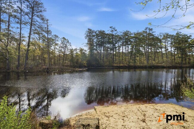 Building Photo - Stunning 5 Bedroom Waterfront Home with 2 car garage