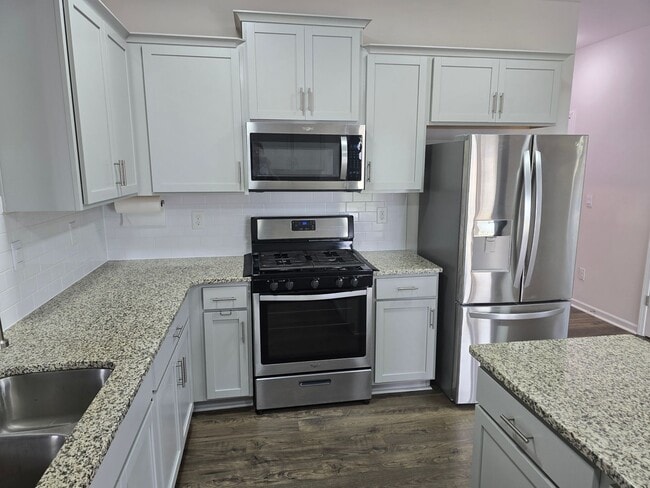 Building Photo - Corner Lot Rental Home with 4BR/2.5BA, Ful...