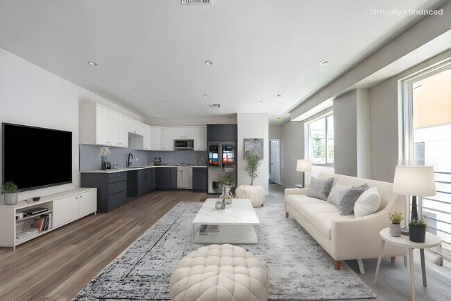 Building Photo - Designer-inspired, tri-level townhome offe...