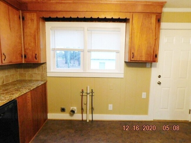 Building Photo - Home with 2 bedrooms, 1 bath, side deck, carport with side porch and detached garage