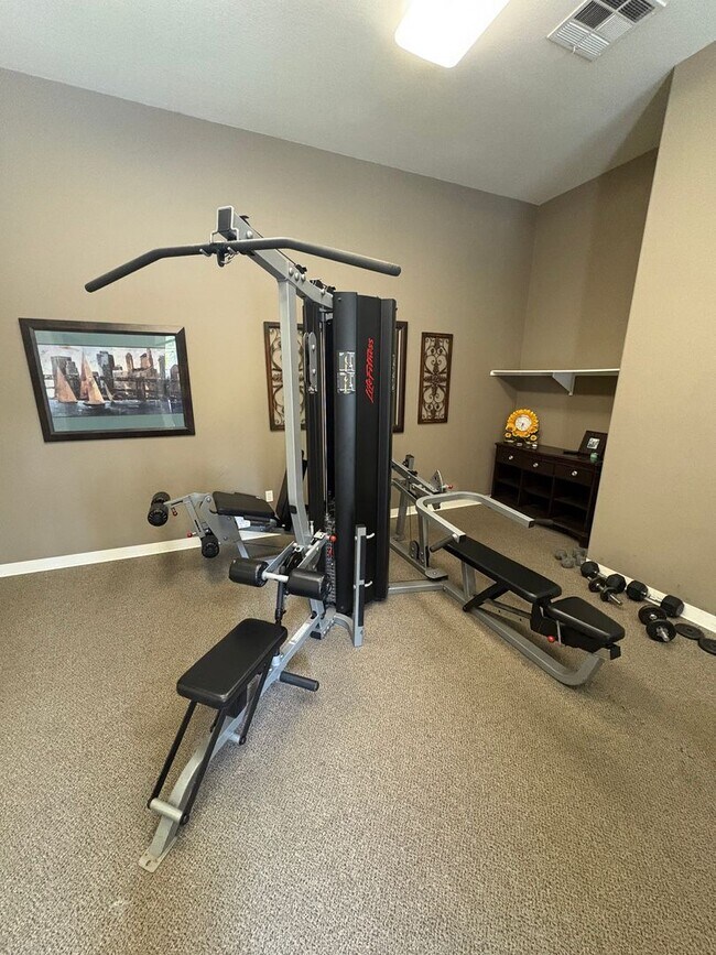 Building Photo - Stunning Home in a Desirable Gated Community