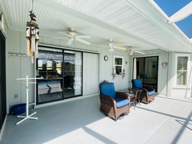 Building Photo - SOUTH GULF COVE-WATERFRONT POOL HOME!