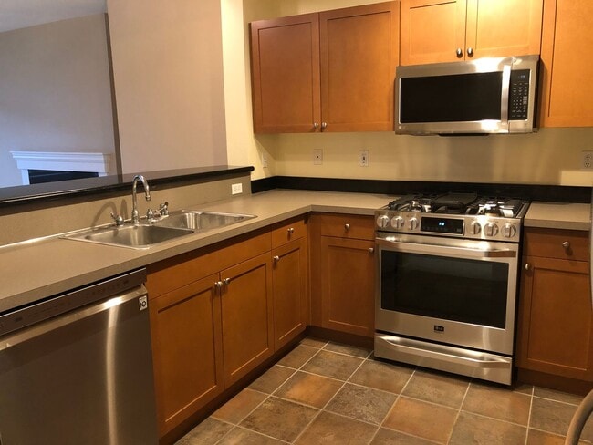 Building Photo - Updated Condo with Parking for One, Great Location and Communal Roof-top Deck!!