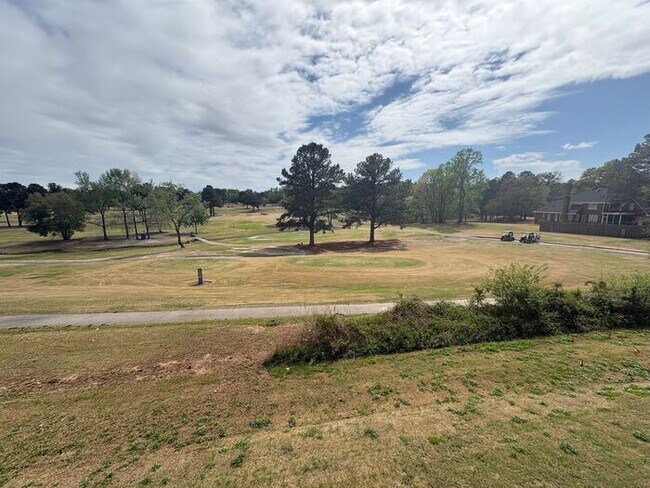 Building Photo - Scenic 3-Bed Townhome with Screened Porch, First Floor Storage & 1-Car Garage – Overlooking the G...