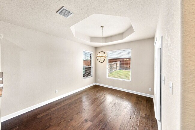 Building Photo - No Rear Neighbors, 3 Car Garage, a Chef's Kitchen, and Room for Everyone