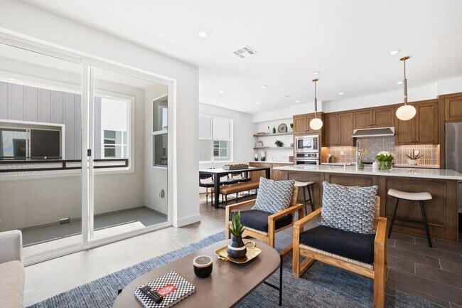 Building Photo - Stylish Tri-Level Townhome in Prime Newpor...