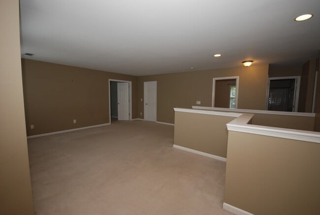 Building Photo - Oversized Executive Style Home with Finish...