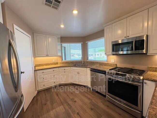 Building Photo - 38251 Desert Greens Dr E