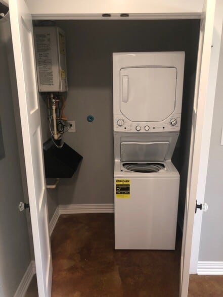 utility closet (new washer/dryer and tankless water heater) - 1742 W Main St