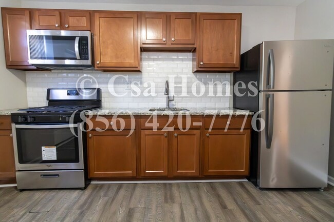 Building Photo - Beautiful 2 Bedroom End Row Home in Liberty Park with Driveway and Shed!