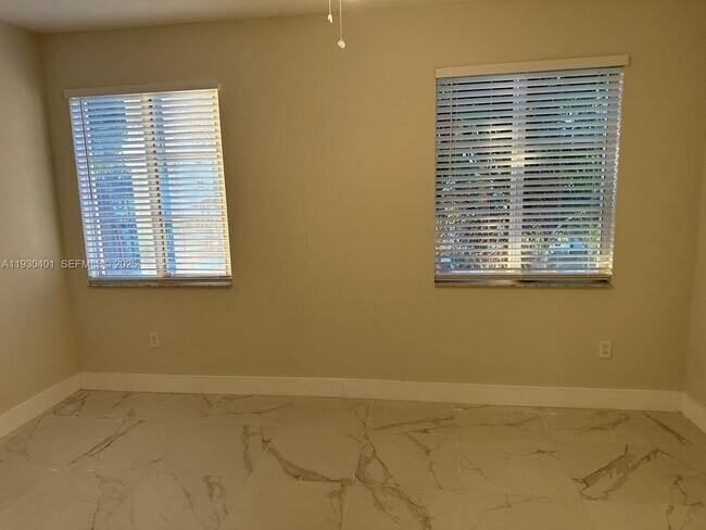 Building Photo - 12421 SW 50th Ct