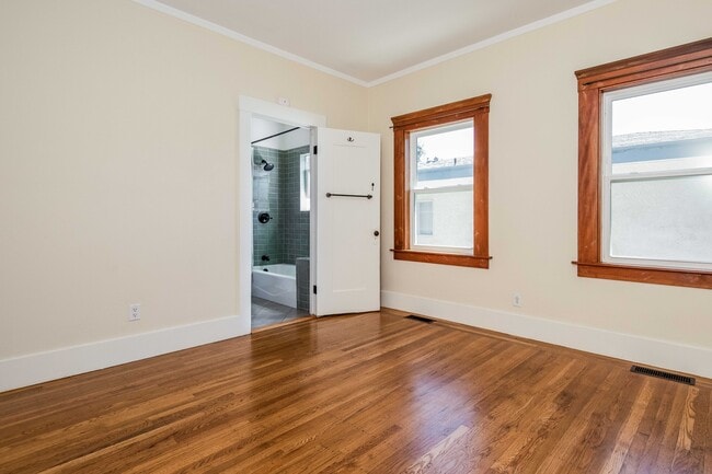Primary bedroom with office and walk in closet. - 431 Athol Ave