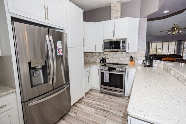 Building Photo - 3 BEDROOM 2 BATH 2 CAR GARAGE POOL HOME W/...