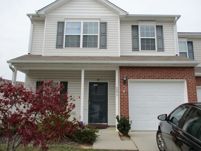 Building Photo - 3 Bedroom Townhouse with a Loft Area and a...