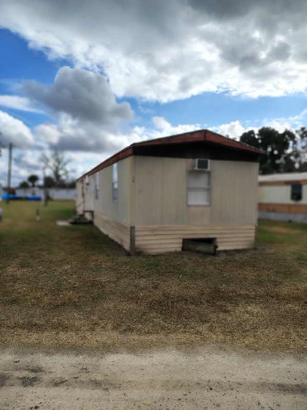 Building Photo - 128 SE Guinevere Ct