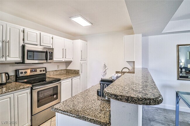 Building Photo - 5055 W Hacienda Ave