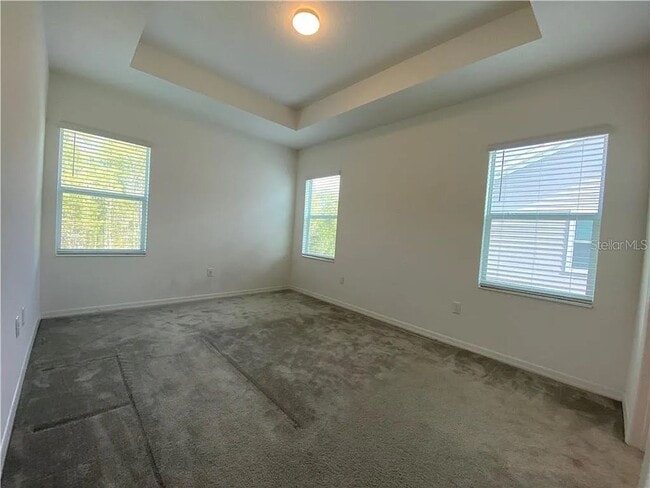 Building Photo - Beautiful End Unit Townhome Near Lake Nona w/ 2-Car Garage & Conservation Views!