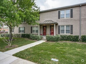 Building Photo - BELOVED BORDEAUX VILLAGE CONDO!