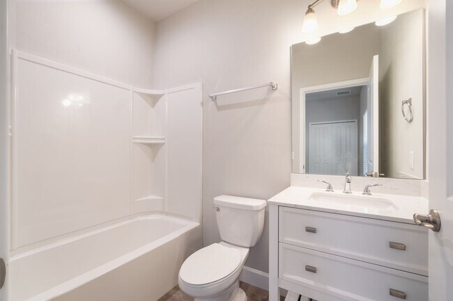 Building Photo - The Reef Townhome NOW LEASING FOR FALL 2026!