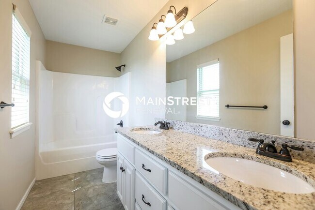 Building Photo - 4 Bedroom Pet-Friendly Home in Gardner, KS with Main Street Renewal