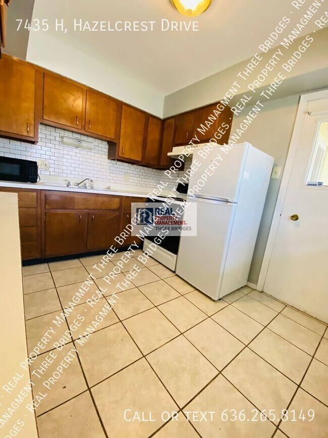Building Photo - 7435 Hazelcrest Dr