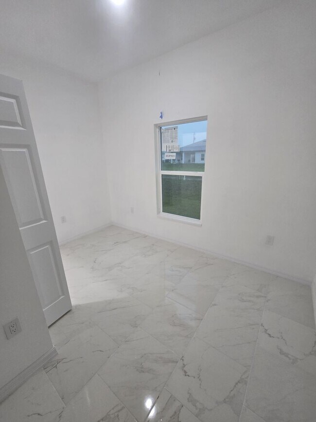 Building Photo - BRAND NEW THREE BEDROOM, 2 BATH, 1 CAR GAR...