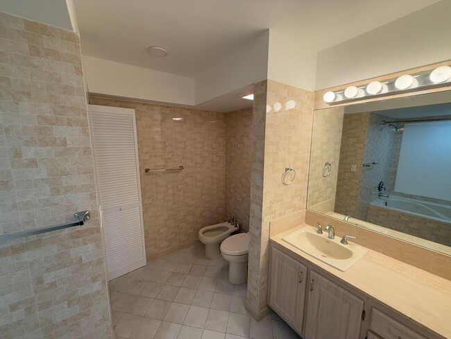 Building Photo - Steps from the beach, this remodeled 2-bed...