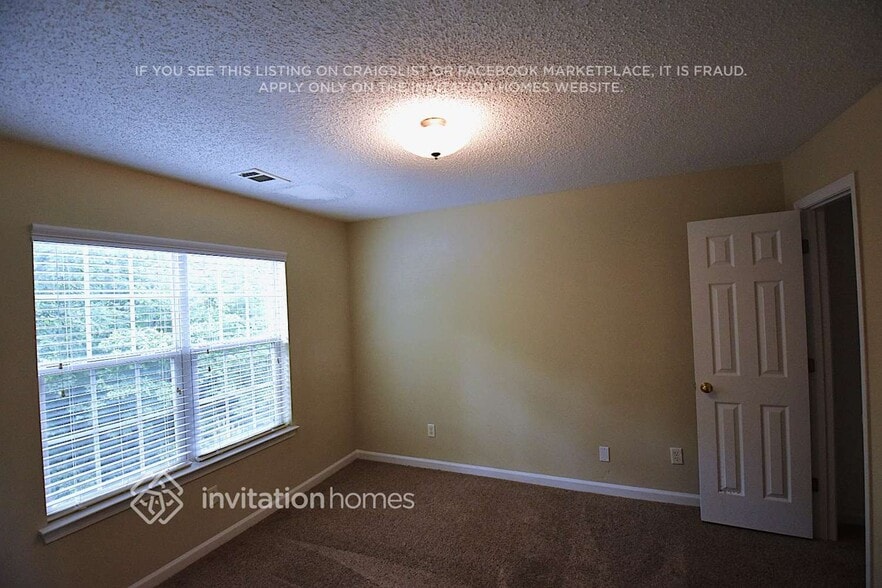Building Photo - 6000 W Rosie Ln SE