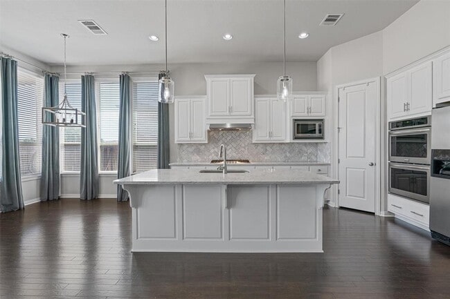 Building Photo - 404 Miracle Rose Way