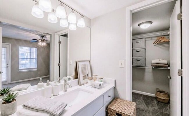 Building Photo - Spacious 2-Bedroom Elite Apartment with Private Balconies & Washer/Dryer