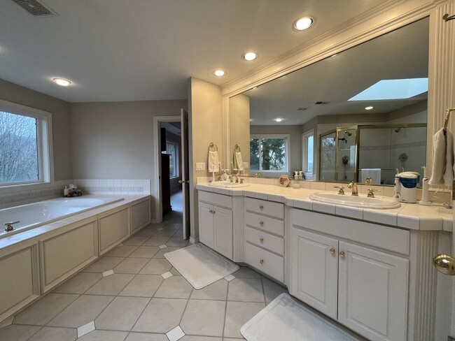 Building Photo - Executive-Style Northwest Heights Home with Forest Views and Refined Architectural Details