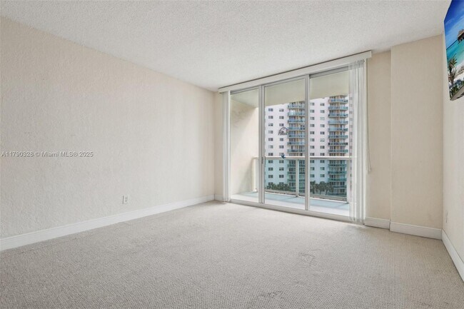 Building Photo - 19390 Collins Ave