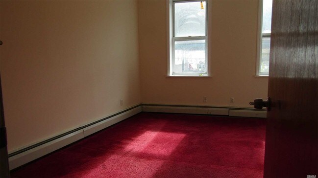 Building Photo - 108-23 Jamaica Ave