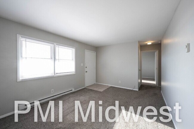 Building Photo - "Charming 2-Bedroom Retreat with 800 Sq. Ft. of Comfort in New Palestine!"