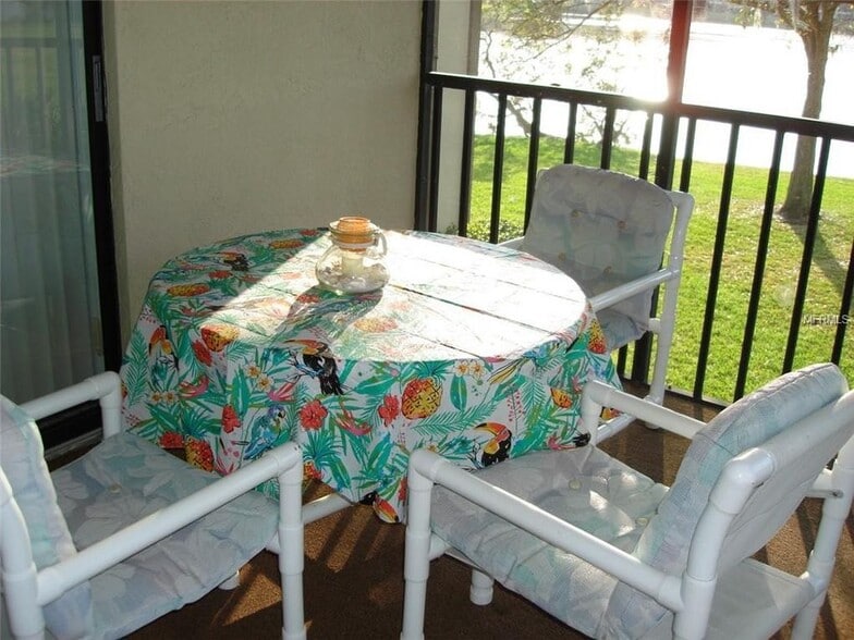 Lake facing balcony - 202 Woodlake Wynde