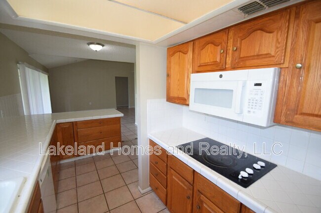 Building Photo - 1204 Honeytree Ln W