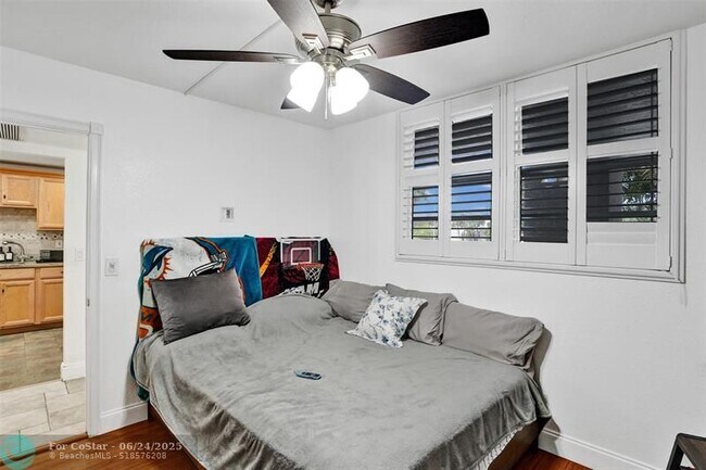 Building Photo - 9480 Poinciana Pl