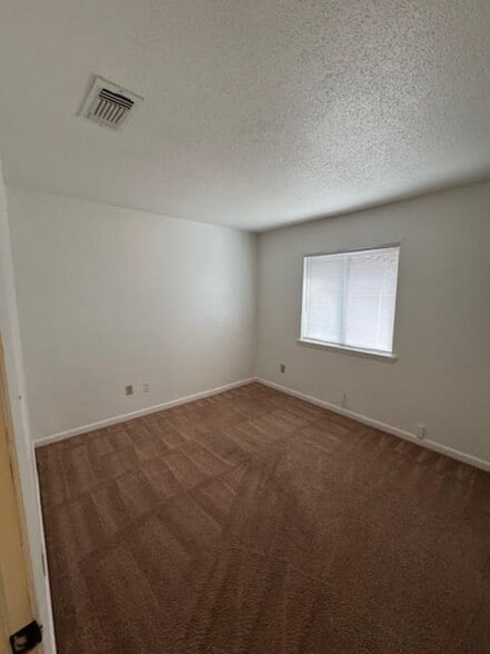 Building Photo - 6 Whispering