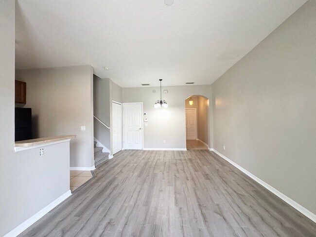 Building Photo - Gated 3B/2.5B Sanford Townhome ~ Fresh paint! ~ New flooring!