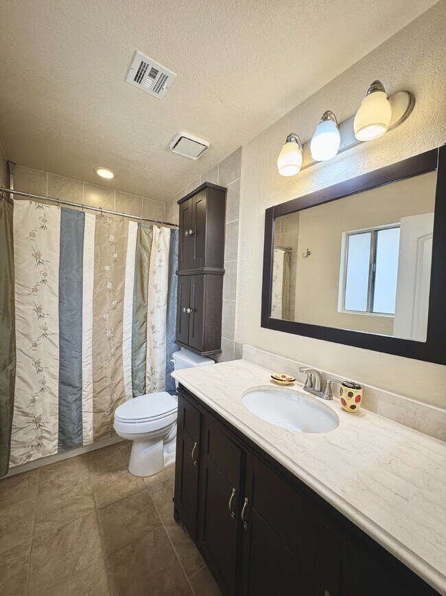 Building Photo - Fully Furnished Henderson Rental Near Cadence | 2 Bed Home w/ Solar + Backyard | Close to Cowabun...