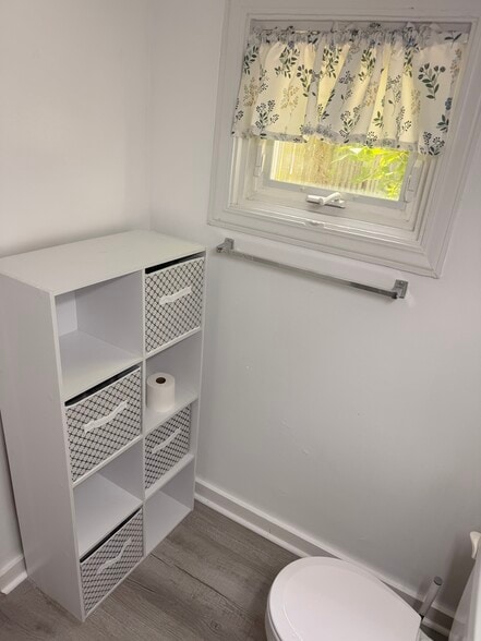 Bathroom window and storage - 201 Ridge Ave