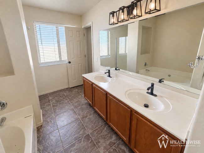 Building Photo - Now Available! Spacious 4 Bedroom Home with Den in Rita Ranch