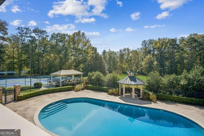 Building Photo - 9026 Riverbend Manor