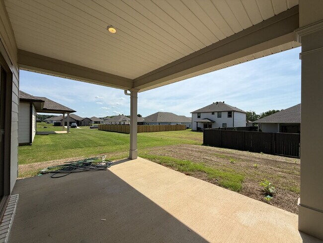 Building Photo - "NEWLY BUILT- Spacious 4-Bedroom Haven with Granite Elegance and Cozy Fireplace in Harvest"