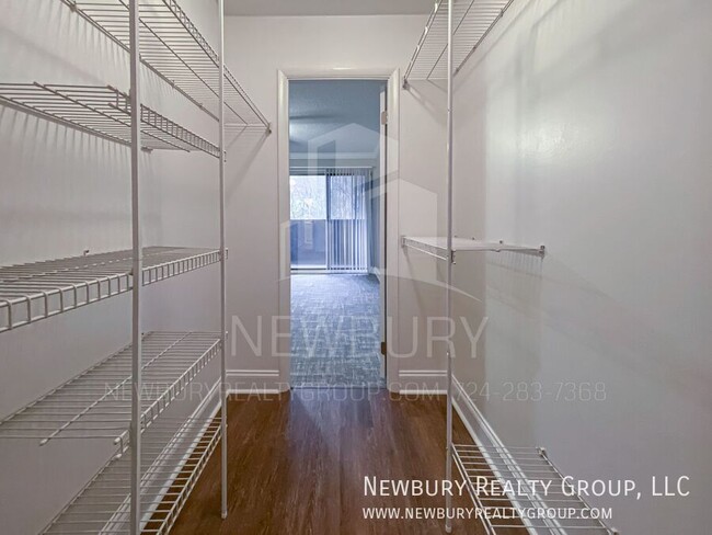 Building Photo - Luxury 1-Bedroom Penthouse with Modern Ren...