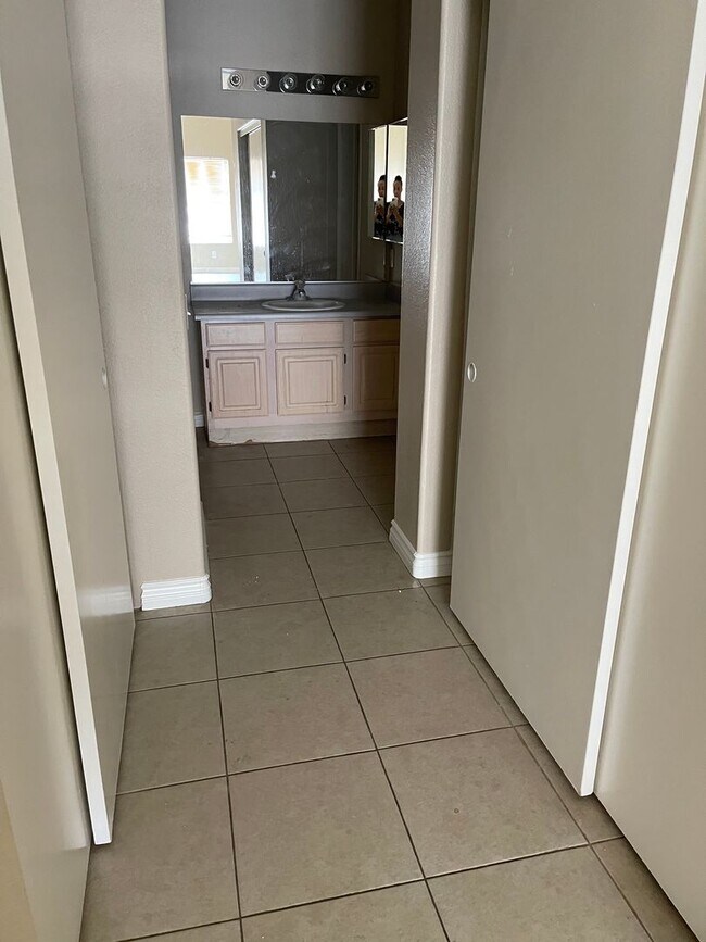 Building Photo - Spacious Condo with Loft & 2-Car Garage – Minutes from the Strip!