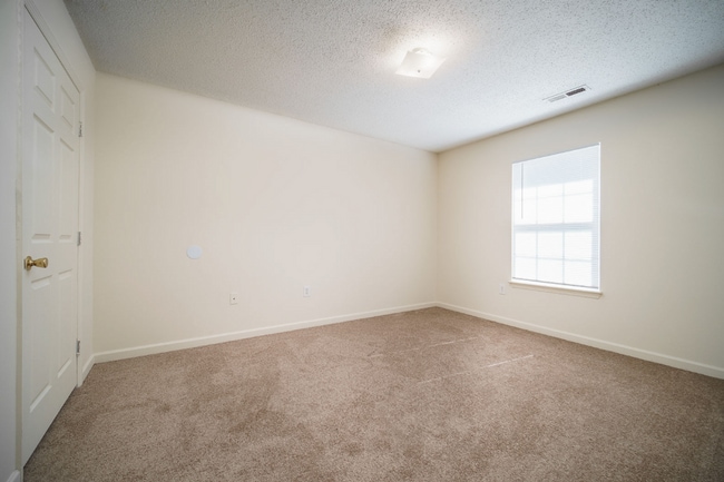 Building Photo - All Brick Building************Massive 2 Bedroom Villa************Single Level Villas