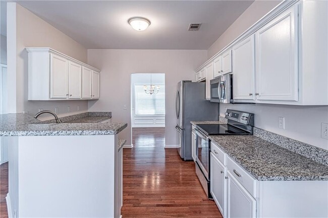Building Photo - 2849 Suttonwood Way NE